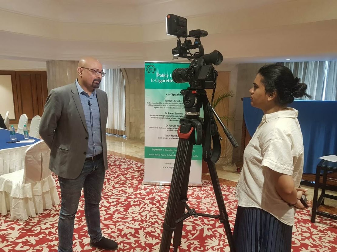 Samrat Chowdhery being interviewed by a television crew at an AVI Policy Dialogue on E-Cigarettes, New Delhi